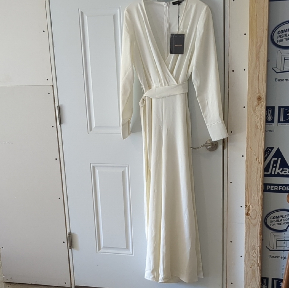 Peace + Love Vintage Wrap Jumpsuit With Highcut leg.